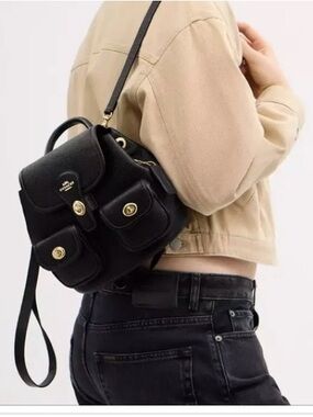 Coach Black Pebbled Leather Mini Backpack with Front Pocket Detail